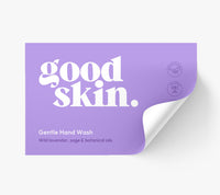 A lavender purple product box or package with the words 'good skin.' in large white lowercase letters, plus smaller text reading 'Gentle Hand Wash' and 'Wild lavender, sage & botanical oils.